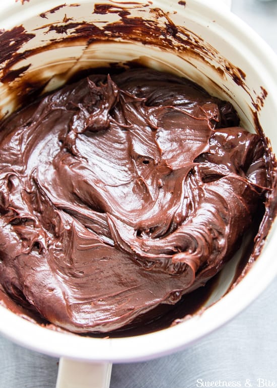 A bowl of softened dark chocolate ganache.