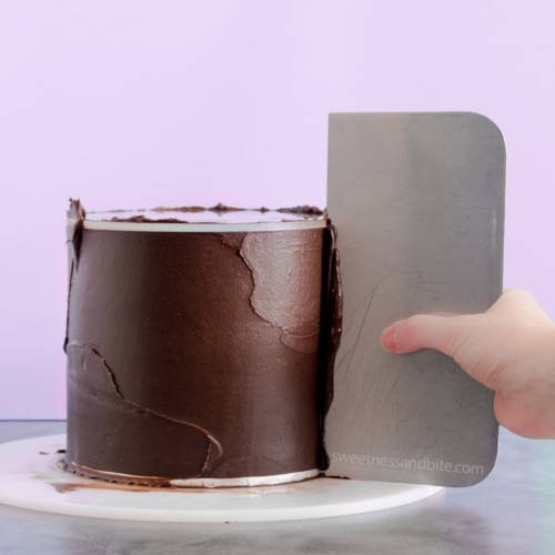 How to achieve sharp edges on cake with butter ganache