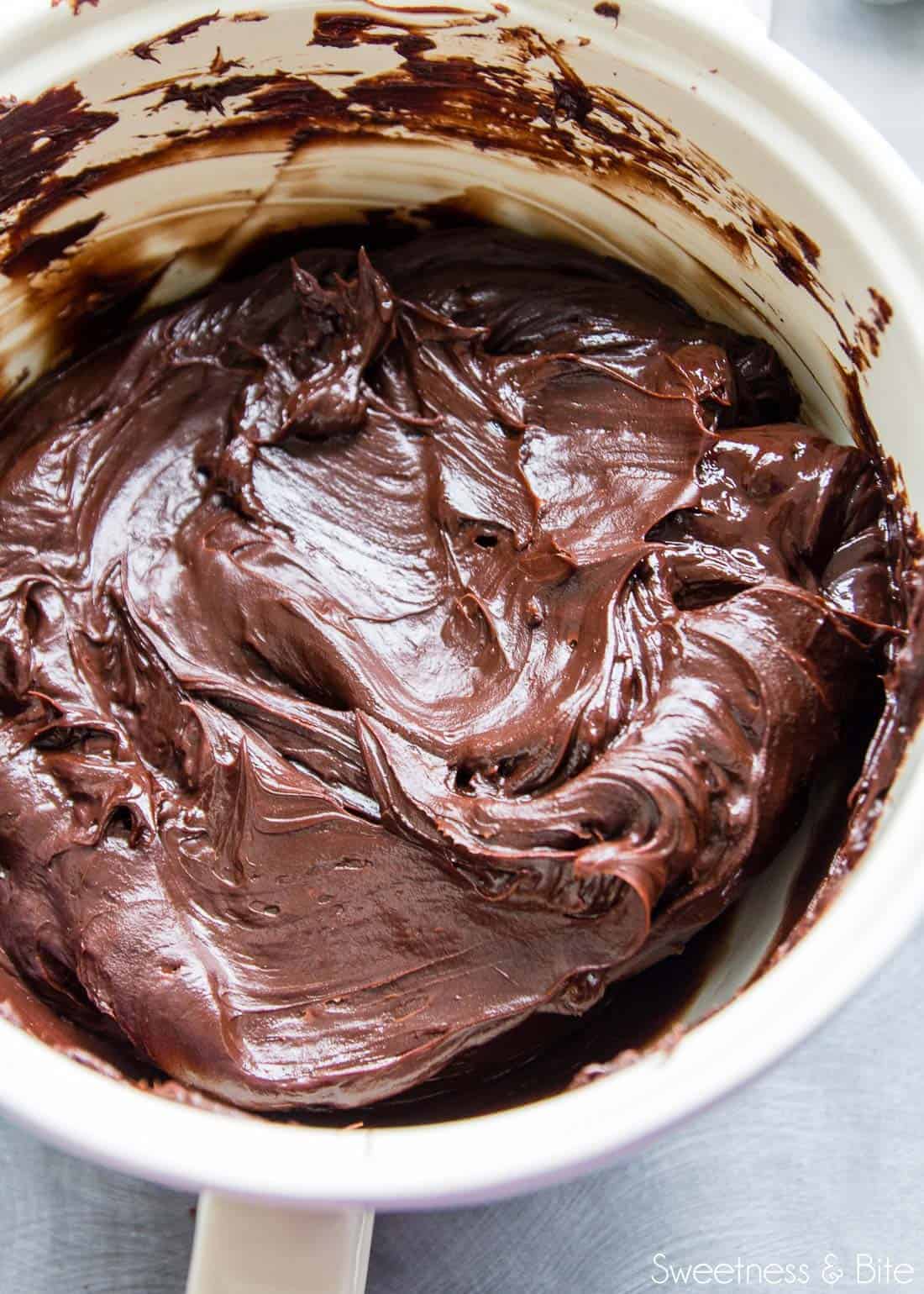 Dark chocolate ganache in a bowl.