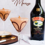 Two cocktail glasses filled with mousse, with a Baileys bottle in the background, text overlay reads: 