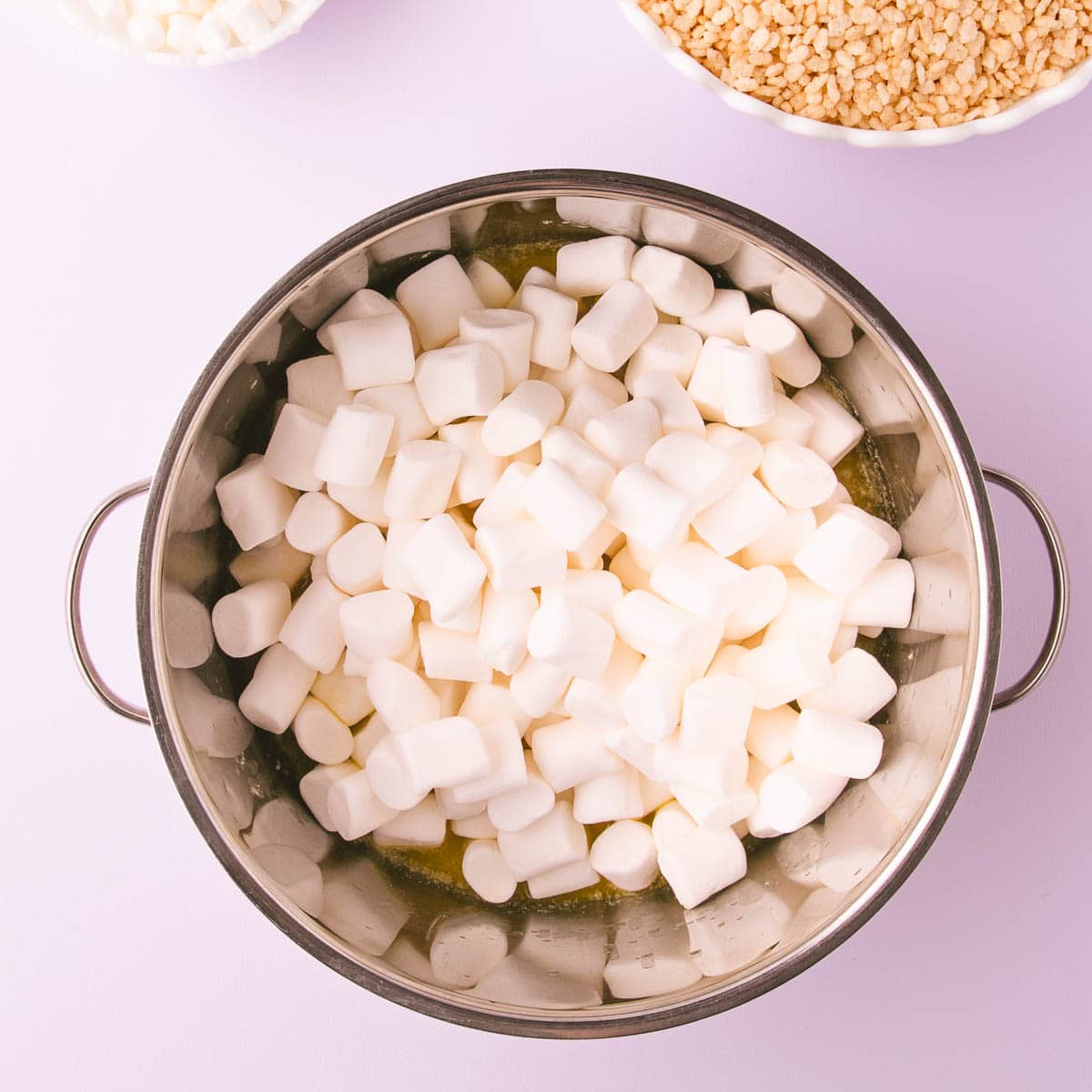 The marshmallows added to the pan.