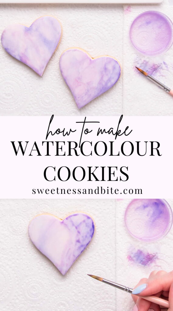 A tall collage of two images, top image shows two heart shaped cookies painted with a wash of pinks and purple, bottom shows a hand painting one of the cookies. Text overlay reads "how to make watercolour cookies".